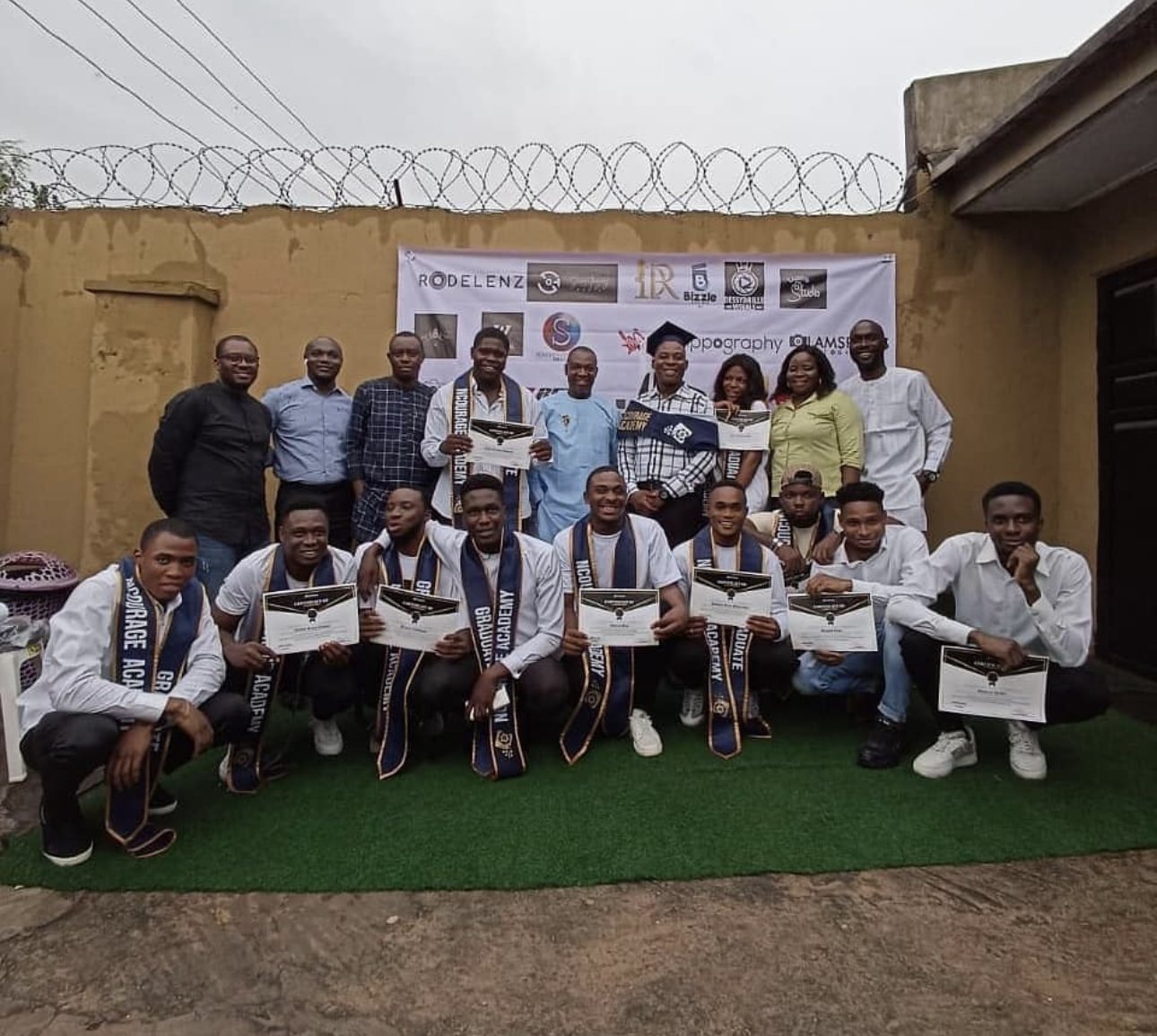 A graduating batch of ncourage Academy with their certificates