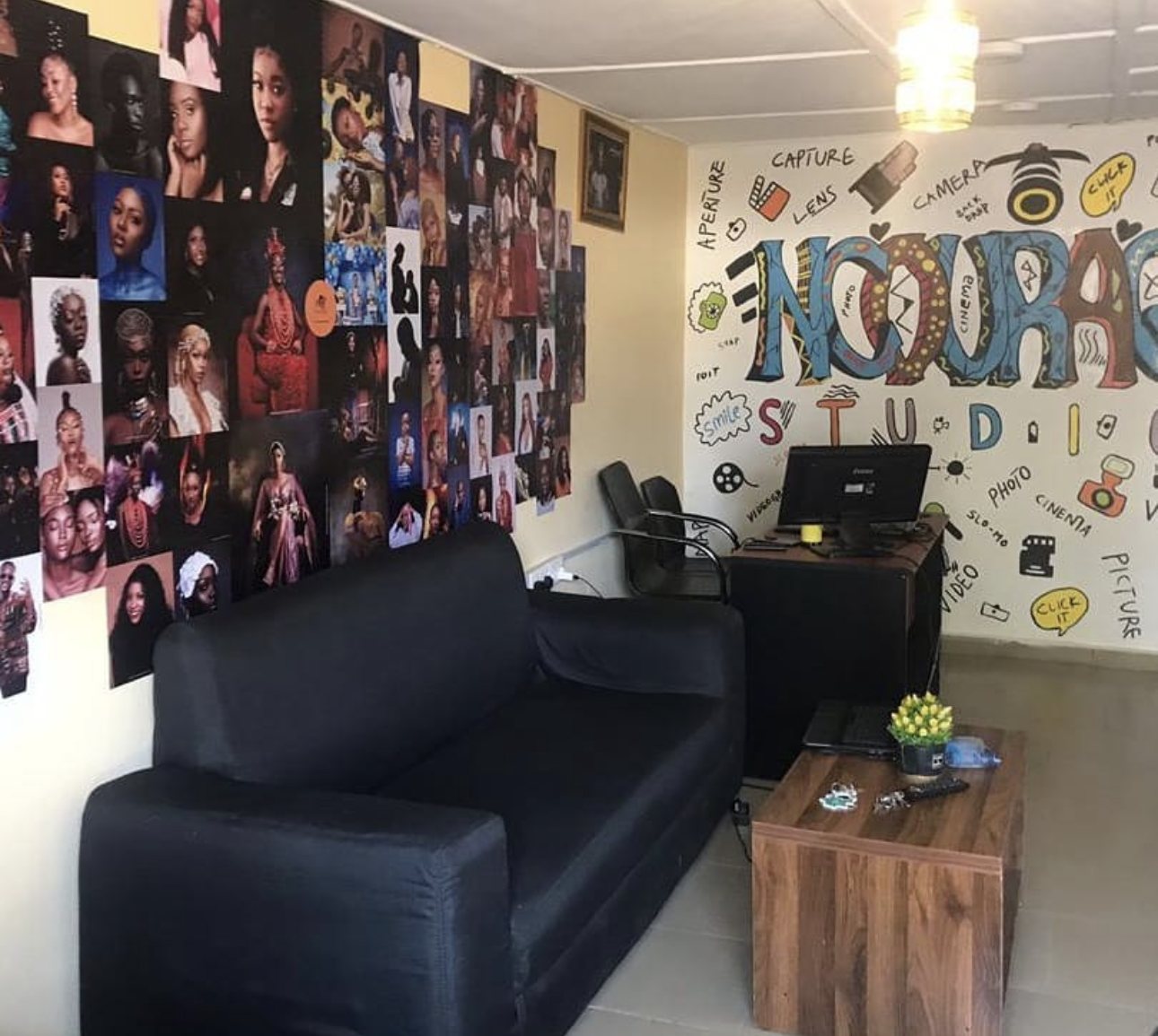 The reception with a wall of portraits shot at the studio